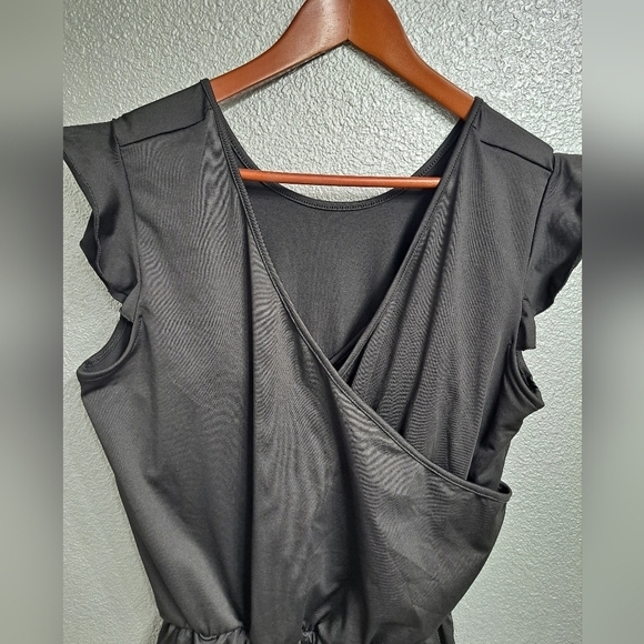 Black Romper With A Ruffled Short/Swimsuit - Picture 2 of 9